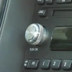 2001-2004 Flat Style Billet Aluminum Radio Button Polished